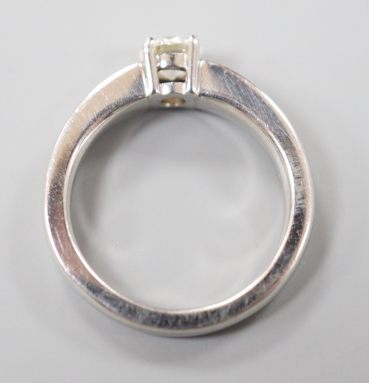 A modern platinum and solitaire diamond ring, size M, gross weight 8.7 grams